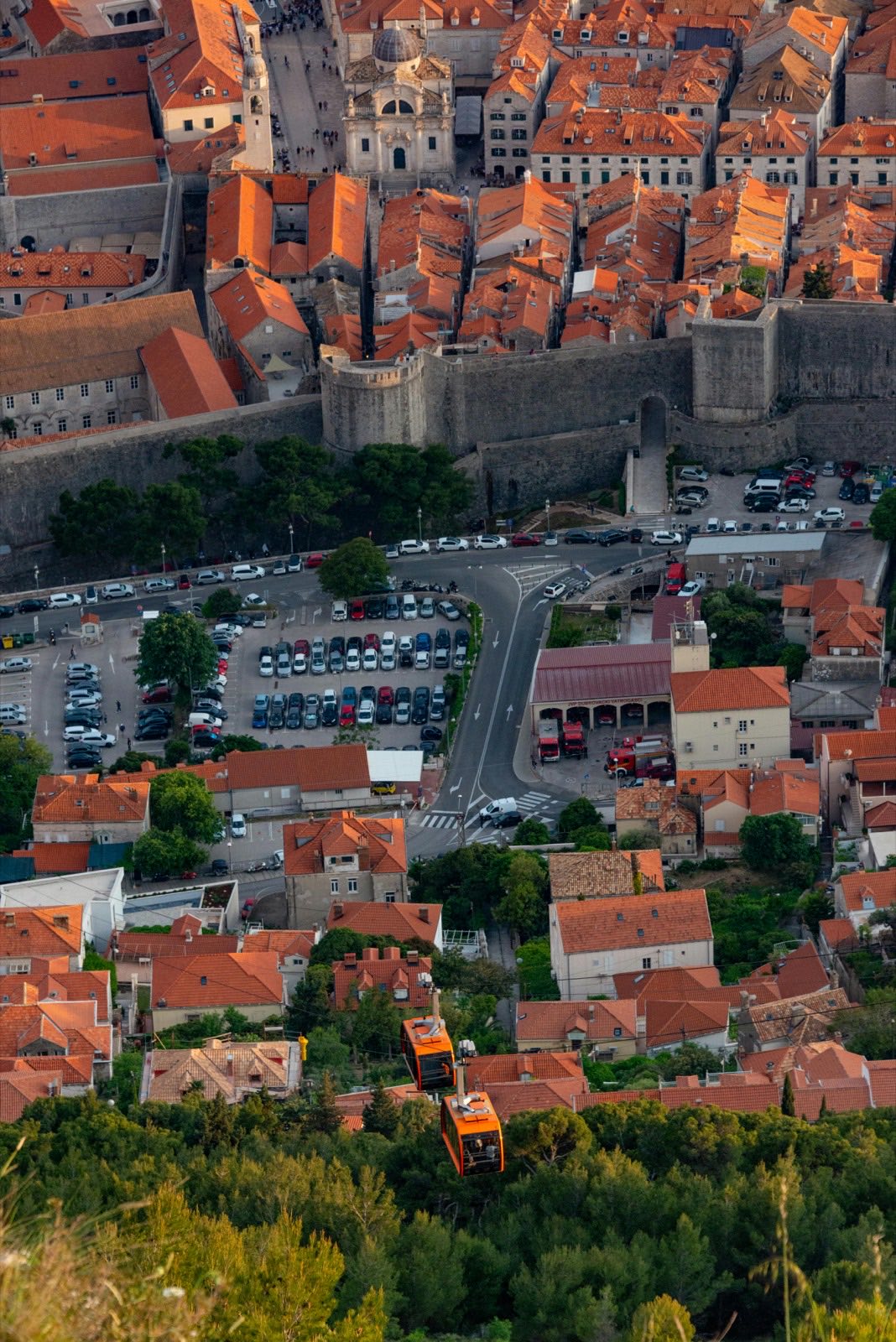 Aerial view of Dubrovnik Old Town walls with the car parks and access roads outside them