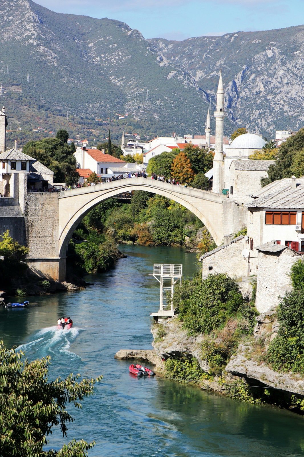The Old Bridge in Mostar arching over the turquoise Neretva river